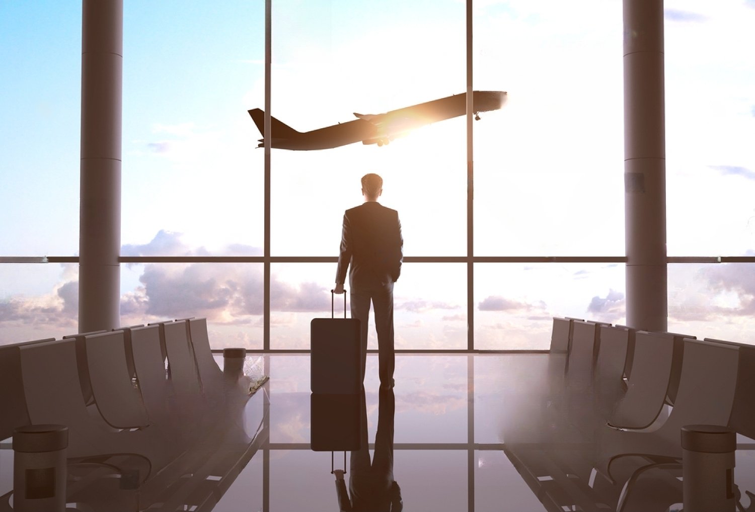 stock-photo-businessman-in-airport-and-airplane-in-sky-140088655
