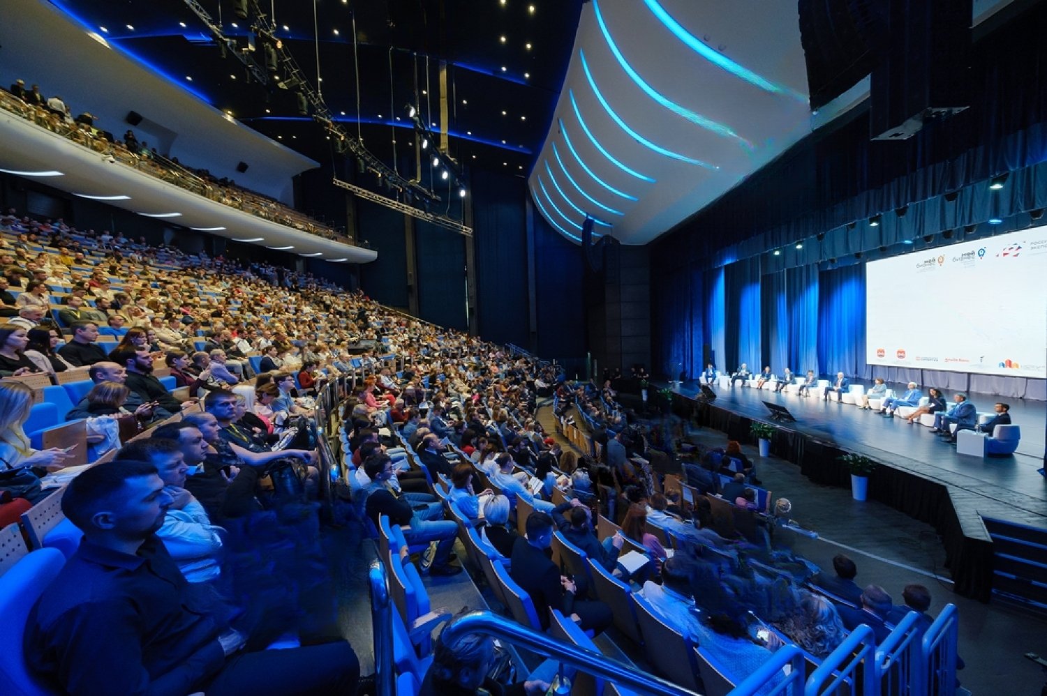 stock-photo-svetlogorsk-russia-october-business-conference-attendees-sit-and-listen-to-lecturer-at-1697662870